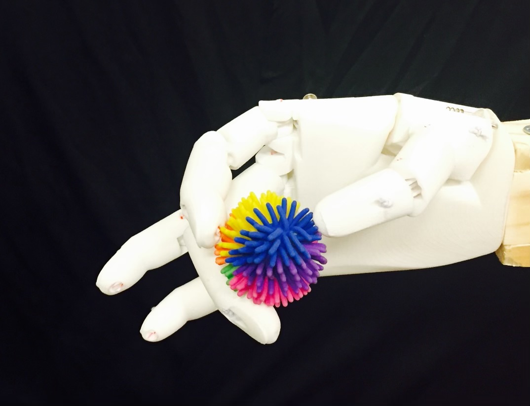 Bionic hand squeezing a ball